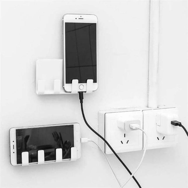 Wall-Mounted Phone Charging Stand With Strong Adhesive holding two phones by power outlet, compact polypropylene wall phone charging holder
