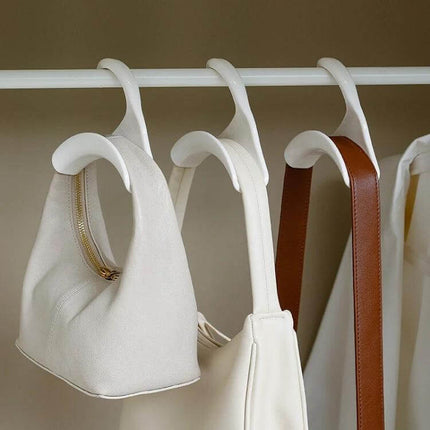 Wardrobe Hat and Scarf Hanger Set, 5-Pack Storage Hooks hanging lightweight bags and scarves on a closet rod for space-saving organization