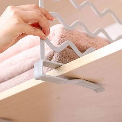 Wardrobe Partition Bars Two Tone White And Gray For Closet Organization installed on shelf holding towels, polypropylene divider for board up to 2 cm
