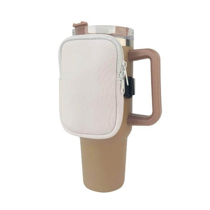 Water Cup Side Pocket Zipper Bag For 40oz Tumbler On The Go attached to beige 40oz tumbler with side handle for hands-free storage
