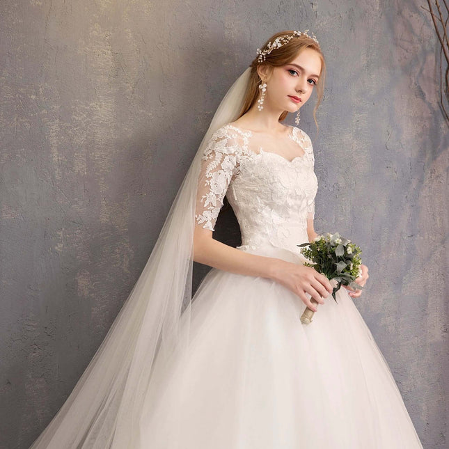Wedding Dress Slim Fit Lace Mid Sleeve Plus Size For Your Wedding Day - white slim-fit lace gown with mid sleeves, organza overlay and bouquet