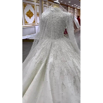 Bride Owner White Wedding Pettiskirt for Bridal Look with beaded long-sleeve high-waist gown and flowing skirt for elegant ceremonies