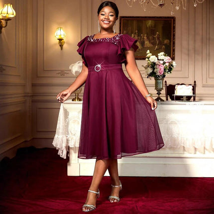 Wine Red Summer Mesh Butterfly Sleeve Dress for Wedding Guests model wearing mid-length beaded A-line dress with belt and sandals
