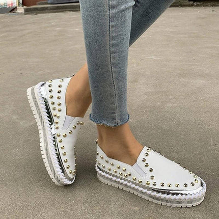 Rivet Canvas Flat Sneakers For Women Casual Everyday white studded canvas slip-on with rubber sole for city commuting and light walking