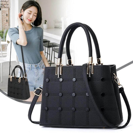 Women's PU Rivet Handbag With Multiple Pockets For Everyday Use - black structured tote with rivet accents and shoulder strap for commuting