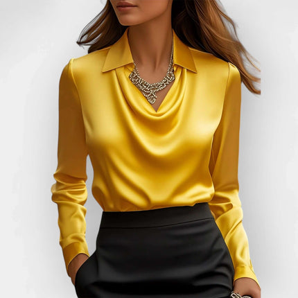 Women’s Satin Swing Collar Long Sleeve Office Blouse in golden satin with draped cowl front, long sleeves and collar styled with statement necklace
