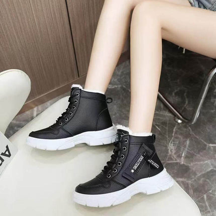 Womens Insulated Waterproof Mid Cut Cotton Walk Shoes in black mid-cut insulated fleece-lined waterproof PU upper on commuter wearing casual urban walk shoes