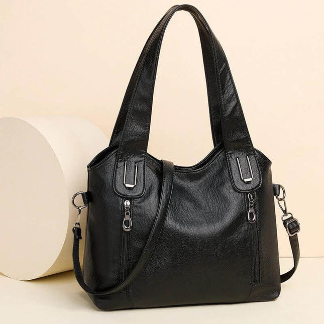 Women's Large Capacity PU Handbag For Everyday Use - black PU leather roomy tote with visible stitching, zipper pockets, shoulder and crossbody straps