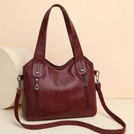 Women's Large Capacity PU Handbag For Everyday Use - burgundy PU leather tote with visible stitching, roomy interior, dual handles and detachable shoulder strap