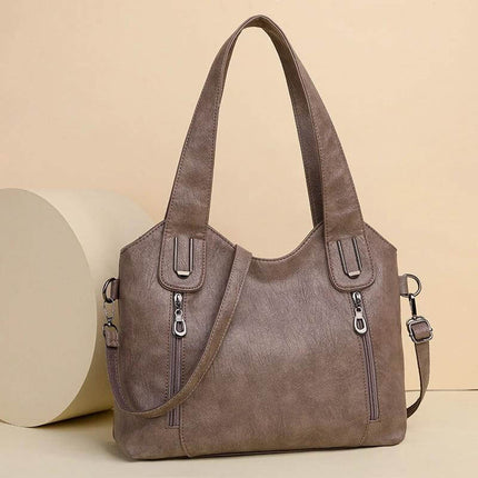 Women's Large Capacity PU Handbag For Everyday Use - brown PU leather roomy tote with visible stitching, dual top handles, detachable shoulder strap, zip pockets