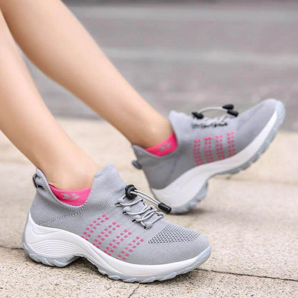 Womens Knit Slip On Casual Sneakers For Everyday Wear in gray knit with pink accents, lightweight stretch upper and foam insole for commuting and errands