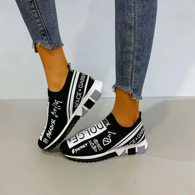 Womens Low Top Casual Flat Sneakers Slip On For Everyday Wear - black slip-on casual sneakers with graphic print, flat wear-resistant rubber sole, easy-fit low-top style