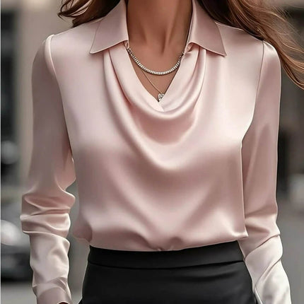 Women's Satin Swing Collar Long Sleeve Office Blouse in blush satin with draped cowl front, long sleeves and classic collar styled with black skirt