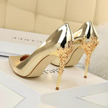 Womens Pointed Toe Stiletto Heels For Everyday Wear in gold patent finish with 10 cm ornate stiletto heel, PU upper and low platform for sleek office or evening looks