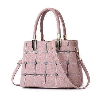 Women's PU Rivet Handbag With Multiple Pockets For Everyday Use - pink textured PU tote with rivet grid, top handles and crossbody strap