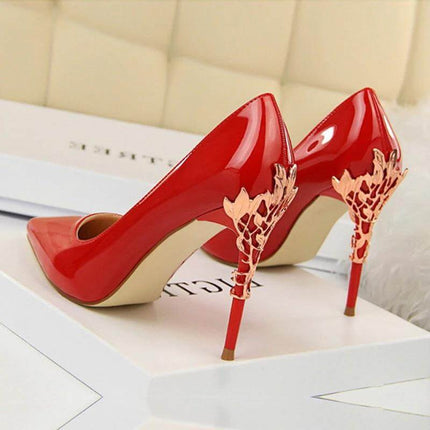 Womens Pointed Toe Stiletto Heels For Everyday Wear in glossy red patent with decorative gold filigree stiletto heel, 10 cm heel, narrow toe silhouette