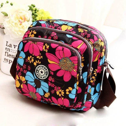 Women's Waterproof Nylon Shoulder Bag For Everyday Use with colorful floral print, zipper pockets, polyester lining, compact crossbody style