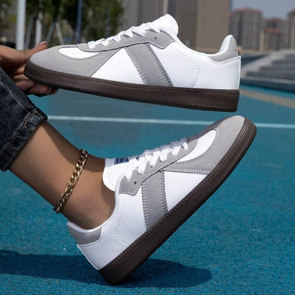 Women's White Lace-Up Casual Sneakers With Leopard Accent Low-Top on feet, white microfiber leather upper with leopard accent and brown outsole