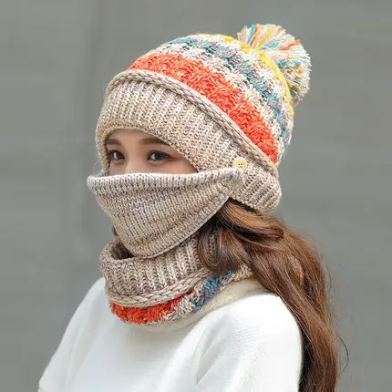Cozy Korean Winter Knitted Hat for Ultimate Warmth and Style 3 Woman Wearing A Knitted Winter Hat With A Pom-Pom And A Matching Scarf That Covers Her Face.