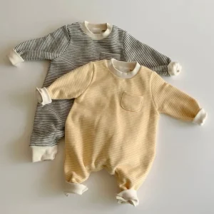 Two Striped Baby Rompers, One Gray With White Stripes And One Yellow With White Stripes, Laid Flat On A Light Background.