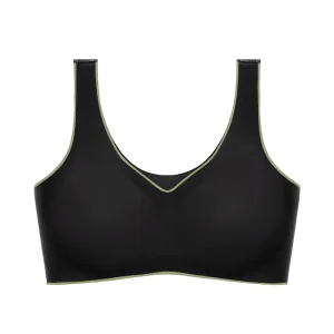 Black sports bra featuring a simple design and green trim along the edges.