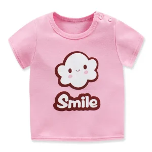 Light pink t-shirt featuring a cloud graphic with the word 'Smile' in bold letters.