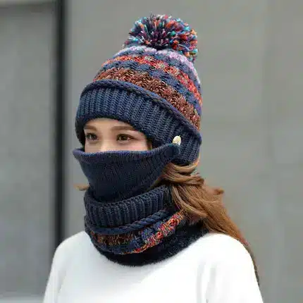 Cozy Korean Winter Knitted Hat for Ultimate Warmth and Style 1 A Woman Wearing A Knitted Winter Hat With A Pom-Pom And A Matching Scarf Covering Her Face.