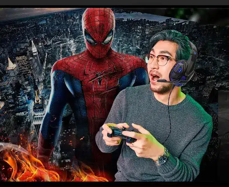 Immersive Sound with Soyto SY830MV Wired Gaming Headphones 12 A Young Man Playing A Video Game With A Surprised Expression, Alongside A Spider-Man Character In A Cityscape Background.