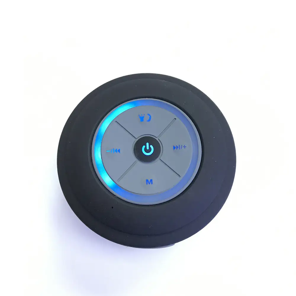 Portable Waterproof Bluetooth Speaker: Ultimate On-the-Go Sound Companion 4 Bluetooth Speaker With Control Buttons Including Play, Pause, And Volume Adjustments In A Circular Design.