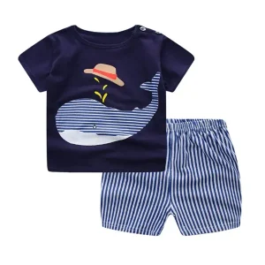 Children's navy blue t-shirt with a whale graphic and striped shorts.