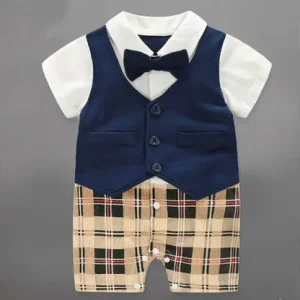 Toddler outfit featuring a navy vest, white shirt, and plaid shorts with a bow tie.