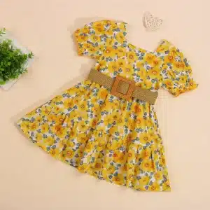 A yellow dress with floral patterns and puff sleeves, featuring a wide belt at the waist.