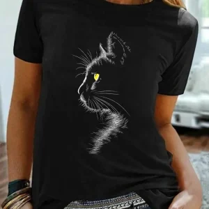 Black t-shirt with a graphic design of a cat's profile featuring a yellow eye.