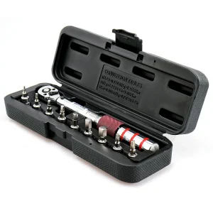 A ratchet wrench set with multiple socket attachments in a black storage case.