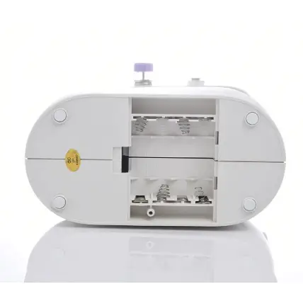 Compact Multifunctional Mini Sewing Machine for Home Projects 5 White Manual Paper Shredder With A Purple Handle And A Transparent Compartment For Shredded Paper.
