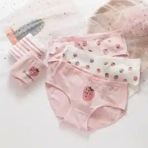 Set of pink women's underwear featuring strawberry designs and patterns on various styles.