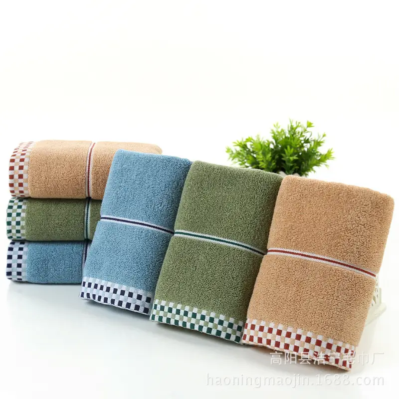 Luxuriously Soft Absorbent Facial Towels for Couples, 2-Pack 10 Stack Of Towels In Various Colors Including Blue, Green, And Brown With Checkered Patterns.