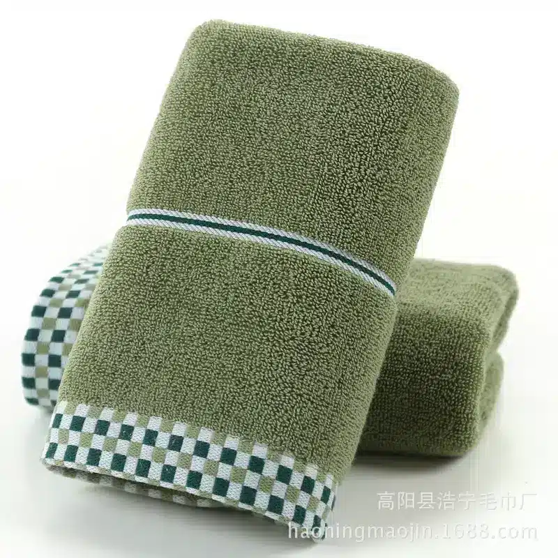 Luxuriously Soft Absorbent Facial Towels for Couples, 2-Pack 4 Two Green Towels Stacked With A Checkered White And Green Trim Along The Edge.