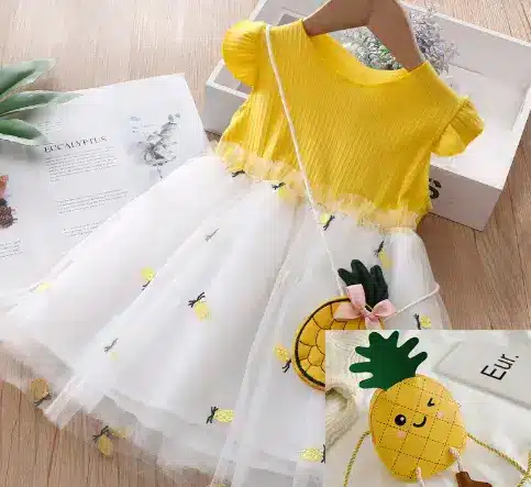 Charming Baby Girl Summer Dress with Delicate Net Yarn Design 7 A Yellow And White Dress Featuring A Pineapple Design And A Matching Pineapple Bag.