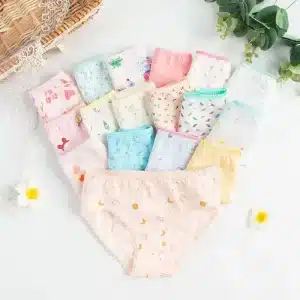 Collection of colorful children's underwear featuring various playful patterns and designs arranged neatly.