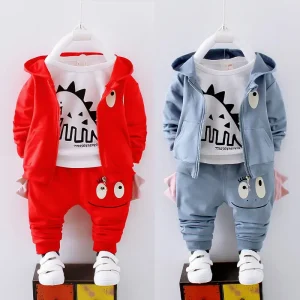 Red and blue children's tracksuit set featuring a dinosaur design on the shirt and pants.