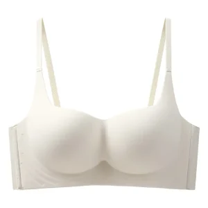 White seamless bra with adjustable straps and molded cups for support.