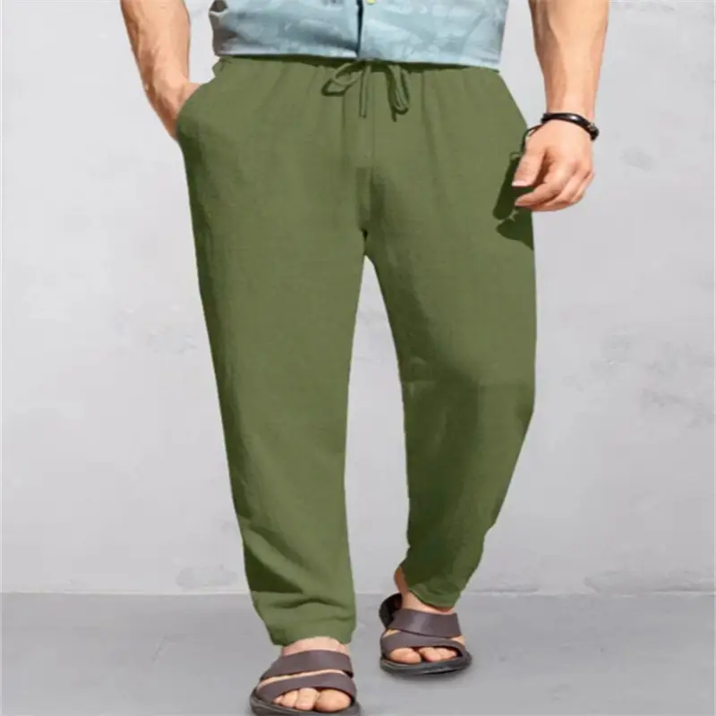 Men's Breathable Linen Outdoor Pants with Drawstring Comfort 5 Man Wearing Olive Green Casual Pants With A Drawstring And Sandals.