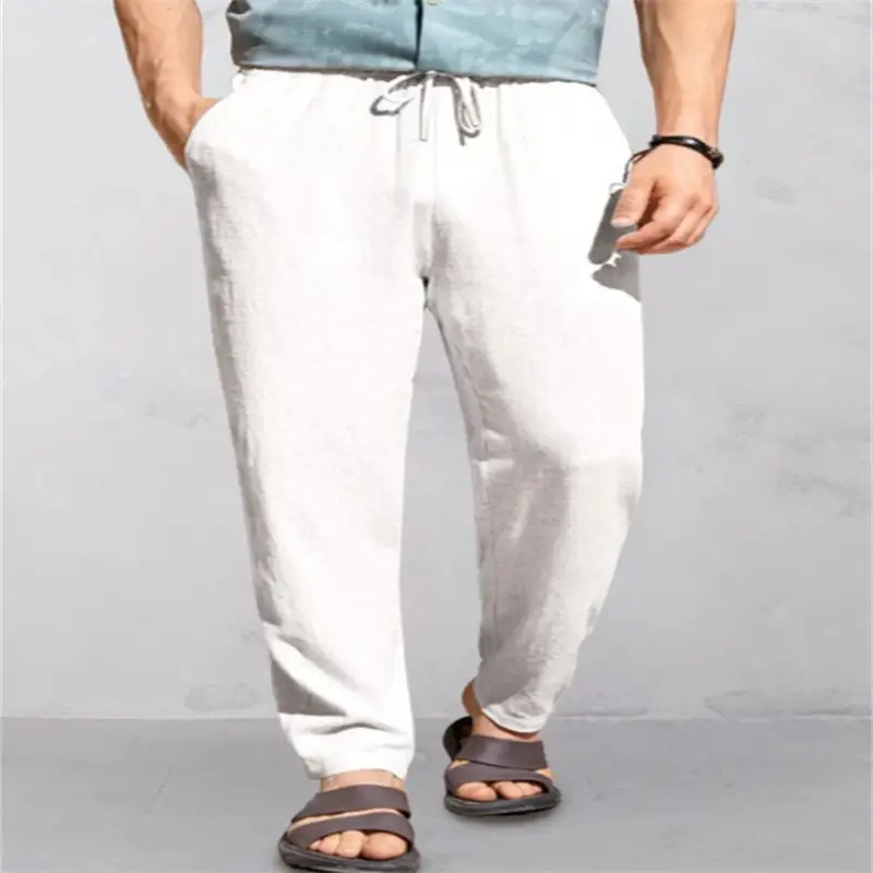 Men's Breathable Linen Outdoor Pants with Drawstring Comfort 6 Light Gray Casual Pants With An Elastic Waistband And Drawstring Worn By A Man Standing In Sandals.