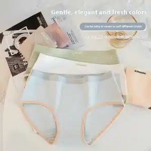 Three pairs of women's underwear in pastel colors: blue, green, and white, with contrasting waistbands.