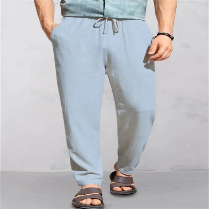 Men's Breathable Linen Outdoor Pants with Drawstring Comfort 3 Light Blue Casual Pants With An Elastic Waistband And Drawstring Worn By A Man Standing.