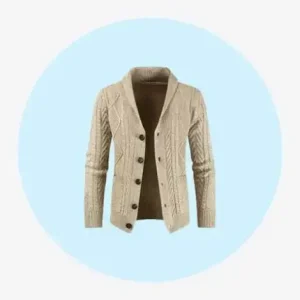 Beige Cable Knit Cardigan With A Shawl Collar And Button Closure Displayed On A Light Blue Background.