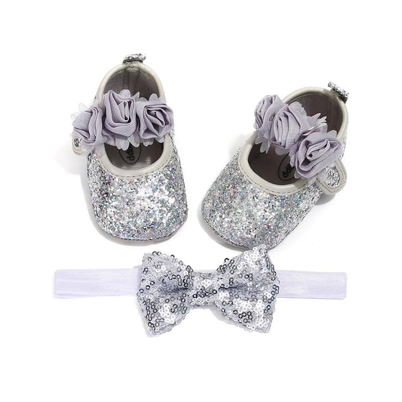 Happy Feet Toddler Baby Shoes - Comfortable and Stylish Pick for Your Little One! 4 Sparkly Baby Shoes With Lavender Ruffle Straps And Sequined Bow Accessory For Special Occasions.