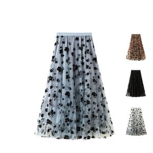 Black floral tulle maxi skirt with a sheer overlay and elastic waistband.