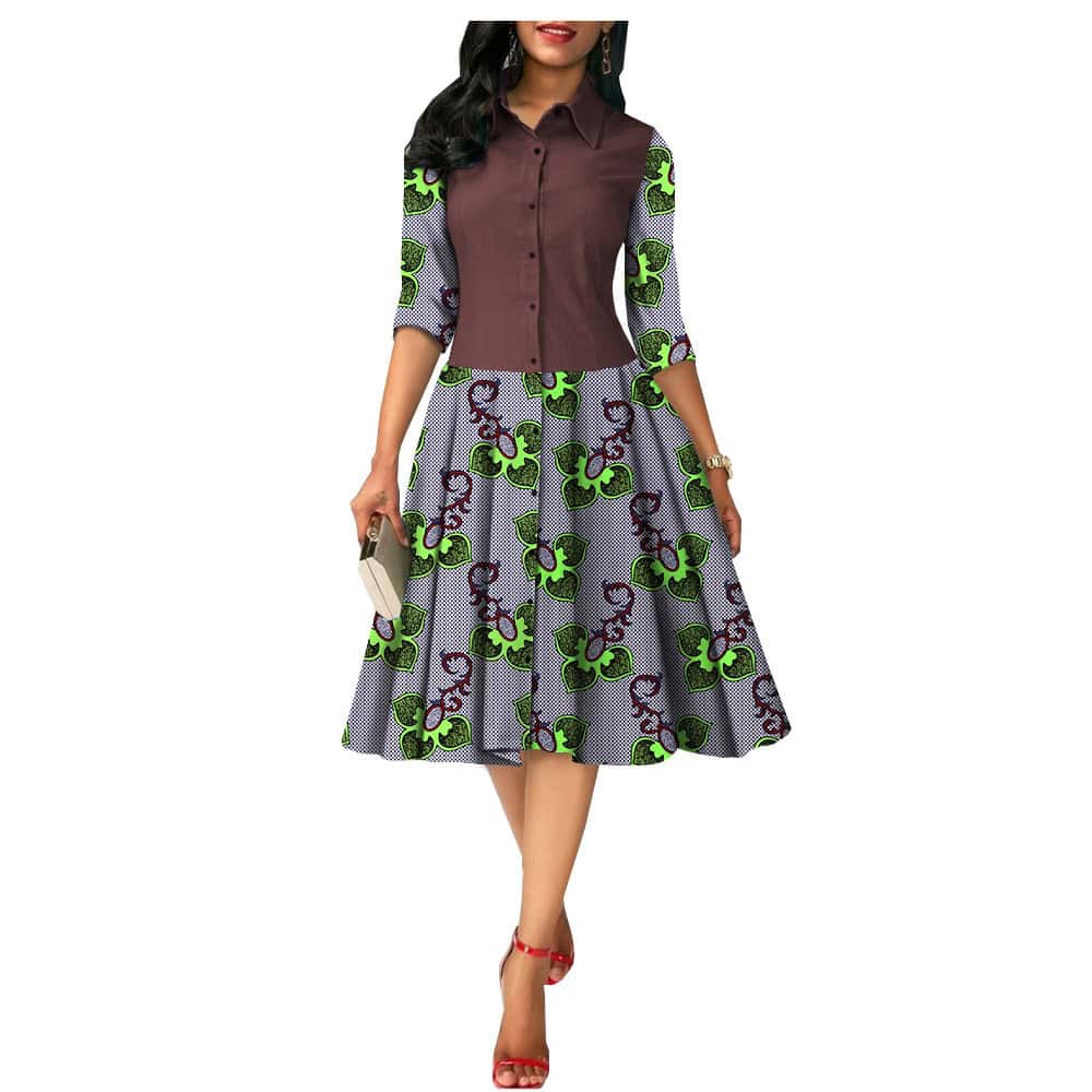 Chic African Print Summer Dress - Ideal for Sunny Days! - Style# 1825054 4 A Printed Midi Dress Featuring A Button-Up Brown Top And A Patterned Skirt With Green And Purple Designs.